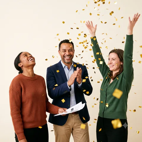 A team celebrating a won proposal
